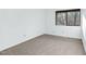 Neutral carpet bedroom with a picture window and light blue walls at 198 Ridge Trl, Chapel Hill, NC 27516