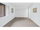 Bright bedroom featuring natural light, a neutral color palette, and closet for ample storage at 198 Ridge Trl, Chapel Hill, NC 27516