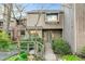 Exterior of a two-story home with a wooden walkway leading to the front door at 198 Ridge Trl, Chapel Hill, NC 27516