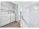 Second story laundry room is conveniently situated outside of the bedrooms for ease at 198 Ridge Trl, Chapel Hill, NC 27516