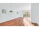 Bright living room with hardwood floors, slider door and neutral wall paint at 198 Ridge Trl, Chapel Hill, NC 27516