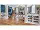 Spacious living room with hardwood floors, fireplace, ample natural light, and an open layout, perfect for entertaining at 2015 Stanchion St, Haw River, NC 27258