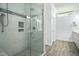 Elegant bathroom showcasing a glass-enclosed shower with modern fixtures and finishes at 2046 Fellini Dr, Apex, NC 27502