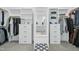 Well-organized closet with custom shelving, drawers, and mirror at 2046 Fellini Dr, Apex, NC 27502