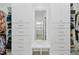 Organized walk-in closet with custom shelving and a convenient built-in bench at 2046 Fellini Dr, Apex, NC 27502