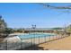 Community pool and recreational area with plenty of space for residents to relax and enjoy the outdoors at 2046 Fellini Dr, Apex, NC 27502