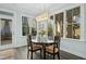 Charming dining area with natural light and a view of the outdoor greenery at 2046 Fellini Dr, Apex, NC 27502