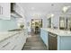 Bright kitchen featuring modern appliances, stylish backsplash, and eat-in dining area at 2046 Fellini Dr, Apex, NC 27502