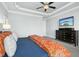 This light and airy main bedroom features large windows and neutral colors at 2046 Fellini Dr, Apex, NC 27502