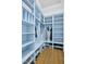 Well organized mudroom featuring custom cubbies, seating, and storage at 2046 Fellini Dr, Apex, NC 27502