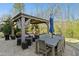 Outdoor living area features a gazebo, patio, and comfortable seating at 2046 Fellini Dr, Apex, NC 27502