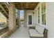 Covered outdoor patio features comfortable seating and access to the backyard at 2046 Fellini Dr, Apex, NC 27502