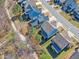 An aerial view highlighting the neighborhood's layout and walking trail access behind the homes at 205 Virginia Water Dr, Rolesville, NC 27571