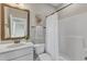 Stylish bathroom with marble countertop sink and vanity, plus a shower-tub combination at 205 Virginia Water Dr, Rolesville, NC 27571