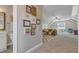 Large bonus room with carpet, an olive couch, a playroom, and a half bathroom at 205 Virginia Water Dr, Rolesville, NC 27571