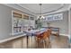 Cozy dining area with stylish furnishings, abundant natural light, and hardwood flooring at 205 Virginia Water Dr, Rolesville, NC 27571