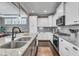 Modern kitchen featuring an island with a sink and stainless steel appliances at 205 Virginia Water Dr, Rolesville, NC 27571