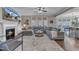 Inviting living room featuring a fireplace, large sofa, neutral walls, and hardwood floors at 205 Virginia Water Dr, Rolesville, NC 27571