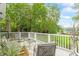 Back deck overlooking the lush yard with lake access at 2140 N Lakeshore Dr, Chapel Hill, NC 27514