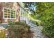 Outdoor space with stone path leading to elevated porch at 2140 N Lakeshore Dr, Chapel Hill, NC 27514