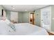 Comfortable bedroom featuring a plush bed, soft bedding, and a relaxing atmosphere at 2140 N Lakeshore Dr, Chapel Hill, NC 27514