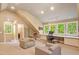 Bright bonus room featuring natural light, built-in desk, and comfortable seating at 2140 N Lakeshore Dr, Chapel Hill, NC 27514