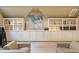 Bonus room featuring built in shelves and neutral colors at 2140 N Lakeshore Dr, Chapel Hill, NC 27514