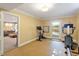 Home gym equipped with workout machines, a door to the outside, and a mirror at 2140 N Lakeshore Dr, Chapel Hill, NC 27514