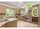 Bright kitchen with stainless steel appliances, ample cabinetry, and natural light at 2140 N Lakeshore Dr, Chapel Hill, NC 27514
