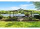 Picturesque gazebo overlooking the lake, providing a serene spot to relax and enjoy the scenery at 2140 N Lakeshore Dr, Chapel Hill, NC 27514