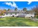 The home's backyard features a screened in porch and a grill at 2246 Arrowhead Rd, Dunn, NC 28334