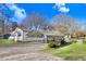 Exterior view of the house, shed, and carport, showcasing the property's features and layout at 2246 Arrowhead Rd, Dunn, NC 28334