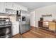 Functional kitchen with white cabinets, stainless steel appliances, and laminate countertops at 2246 Arrowhead Rd, Dunn, NC 28334