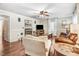 Comfortable living room with a fireplace, hardwood floors, and a relaxed atmosphere at 2246 Arrowhead Rd, Dunn, NC 28334