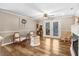 Bright living room featuring hardwood floors, French doors, and a cozy fireplace at 2246 Arrowhead Rd, Dunn, NC 28334