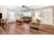Inviting living room with hardwood floors, neutral paint, and ample natural light at 2246 Arrowhead Rd, Dunn, NC 28334