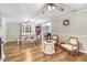 Inviting living room with dining area, hardwood floors, and cozy seating arrangement at 2246 Arrowhead Rd, Dunn, NC 28334