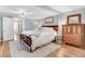 Comfortable bedroom featuring wood floors and a decorative rug at 2246 Arrowhead Rd, Dunn, NC 28334
