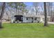 Charming single-story home with a well-maintained lawn and fresh exterior paint at 2312 Valley Rd, Sanford, NC 27330