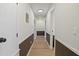 Hallway features wood-look floors and traditional style trim at 2312 Valley Rd, Sanford, NC 27330