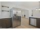 The kitchen features stainless steel appliances and a breakfast bar, perfect for modern living at 2312 Valley Rd, Sanford, NC 27330