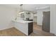 Updated kitchen with stainless appliances, white countertops, and modern lighting fixtures at 2312 Valley Rd, Sanford, NC 27330
