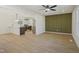 Open concept kitchen/dining area with new appliances, ample counter space, and modern finishes at 2312 Valley Rd, Sanford, NC 27330