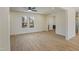 Bright living room with ample natural light, fresh paint, and new floors offering a modern living space at 2312 Valley Rd, Sanford, NC 27330