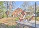 Home exterior featuring a backyard fire pit at 2313 Prince St, Durham, NC 27707