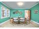 Dining room with modern table and chairs, decorative baskets, and bright natural light at 2313 Prince St, Durham, NC 27707