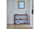 Hallway with decorative console table and mirror at 2313 Prince St, Durham, NC 27707