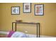 Stylish hallway featuring modern console table and colorful artwork at 2313 Prince St, Durham, NC 27707