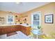 Charming kitchen with wood cabinets, white counters, and a breakfast nook at 2313 Prince St, Durham, NC 27707