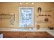 Kitchen sink and counters bathed in bright light from the window at 2313 Prince St, Durham, NC 27707